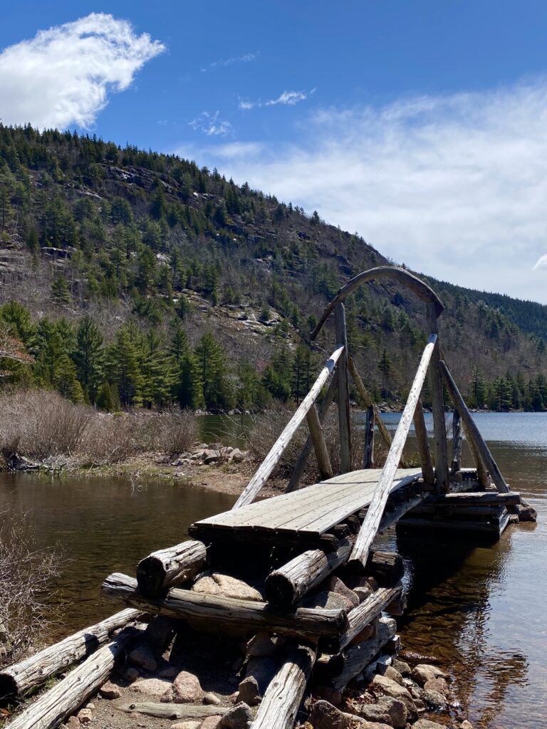 Wooden Bridge over water on Jordan Pond Path at Acadia National Park