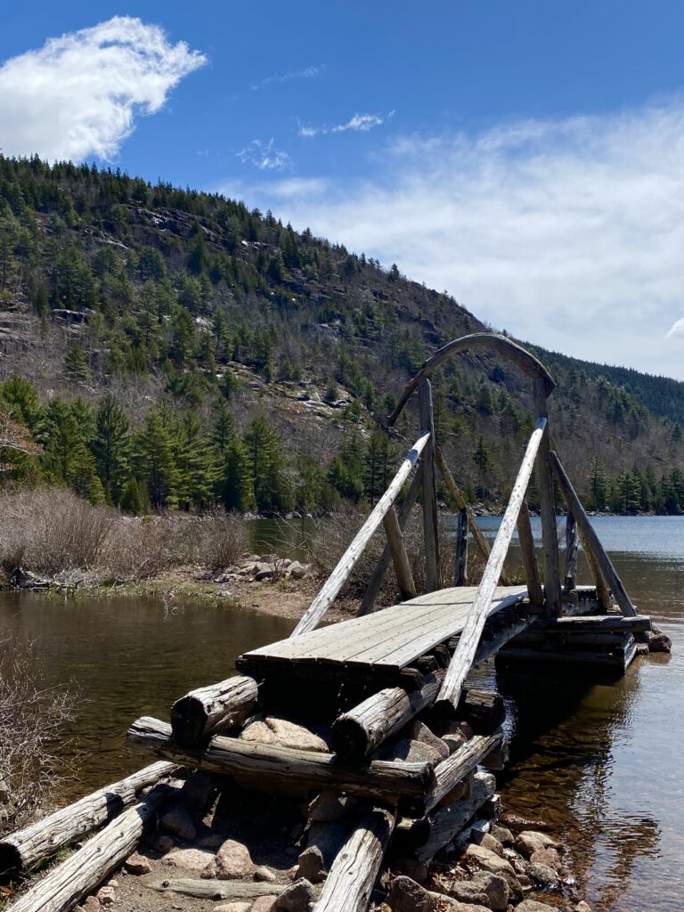 Wooden Bridge over water at Jordan Pond