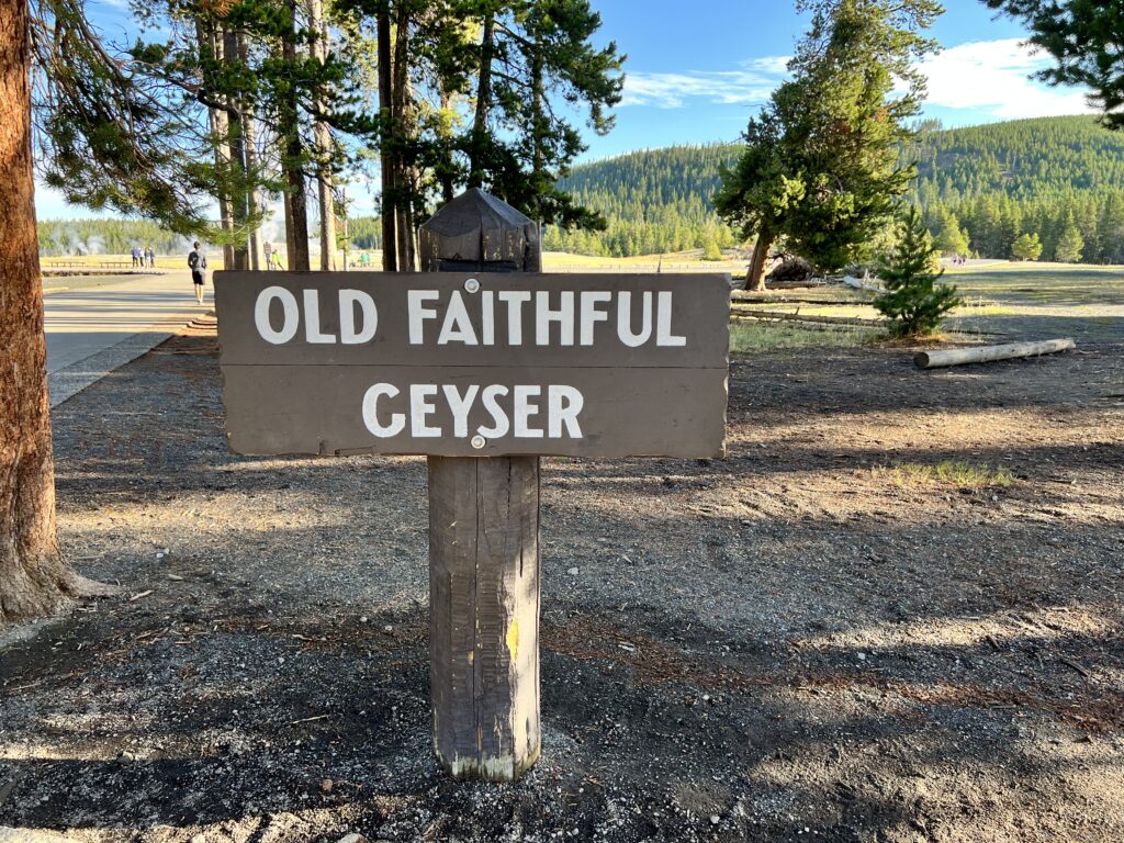 Wooden sign for Old Faithful Geyser